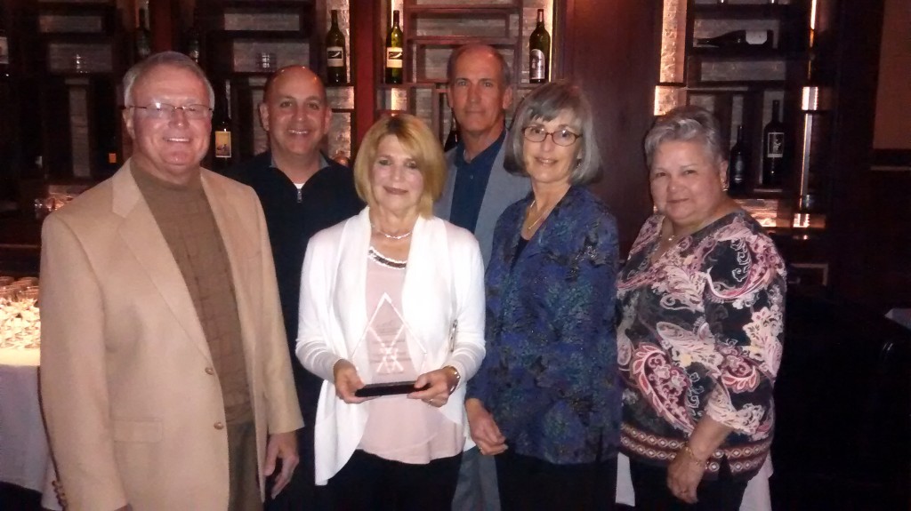 HPTA Honored with CFF Sustainer Award. Pictured, from left, is Jim Crane, Baton Rouge Cystic Fibrosis Board chairman, with HPTA representatives Rusty Jabour, former president; Sandra Harshbarger, president; Gary Mollere, immediate past president, Lisa Sanner, tournament director; and Joycelyn LeBlanc, round robin coordinator.