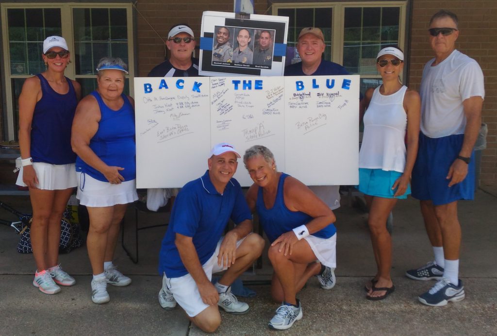HPTA players representing the "Sea of Blue" event were (front row, l-r) Rusty Jabour and Sybil Rhodes; (standing l-r) Paula Davis, Joycelyn LeBlanc (organizer), Steve Jackson, Haggai Davis, Sheri Goings, and David Oliver.